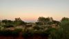 Sunrise at Yulara with full moon, Outback
