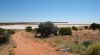 Salt lake on the road with train track, Outback, SA